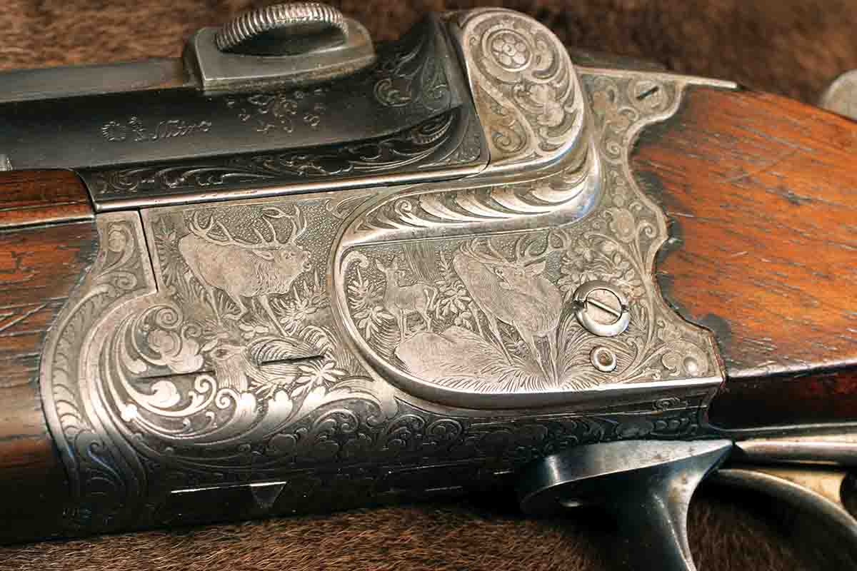 John’s wife’s “guild” gun, an over/under 16-gauge/9x72R, has elaborate game scene engraving typical of high-grade German guns, including red stags roaring during the rut.